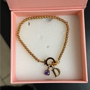 Olivia Jewerly Bracelet with "D" and purple Charm
